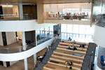 The hanging classroom:  Suspended high above the Collaboration Plaza is the department’s “hanging classroom.” Sunlight filters into both sides of the room, which overlooks the building’s soaring  main atrium. 